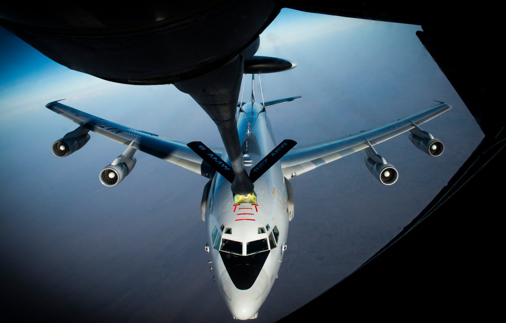 A NATO-owned E-3 Sentry aircraft receives fuel from a KC-135 Statotanker during an in-flight refueling mission over Afghanistan, Dec. 17, 2014.  The E-3 is the central aerial hub of the Airborne Warning and Control System, which is an integrated command and control battle management, surveillance, target detection, and tracking aircraft platform used to provide an accurate, real-time picture of the battlespace to commanders and troops on the ground. (U.S. Air Force photo/Staff Sgt. Travis Edwards)