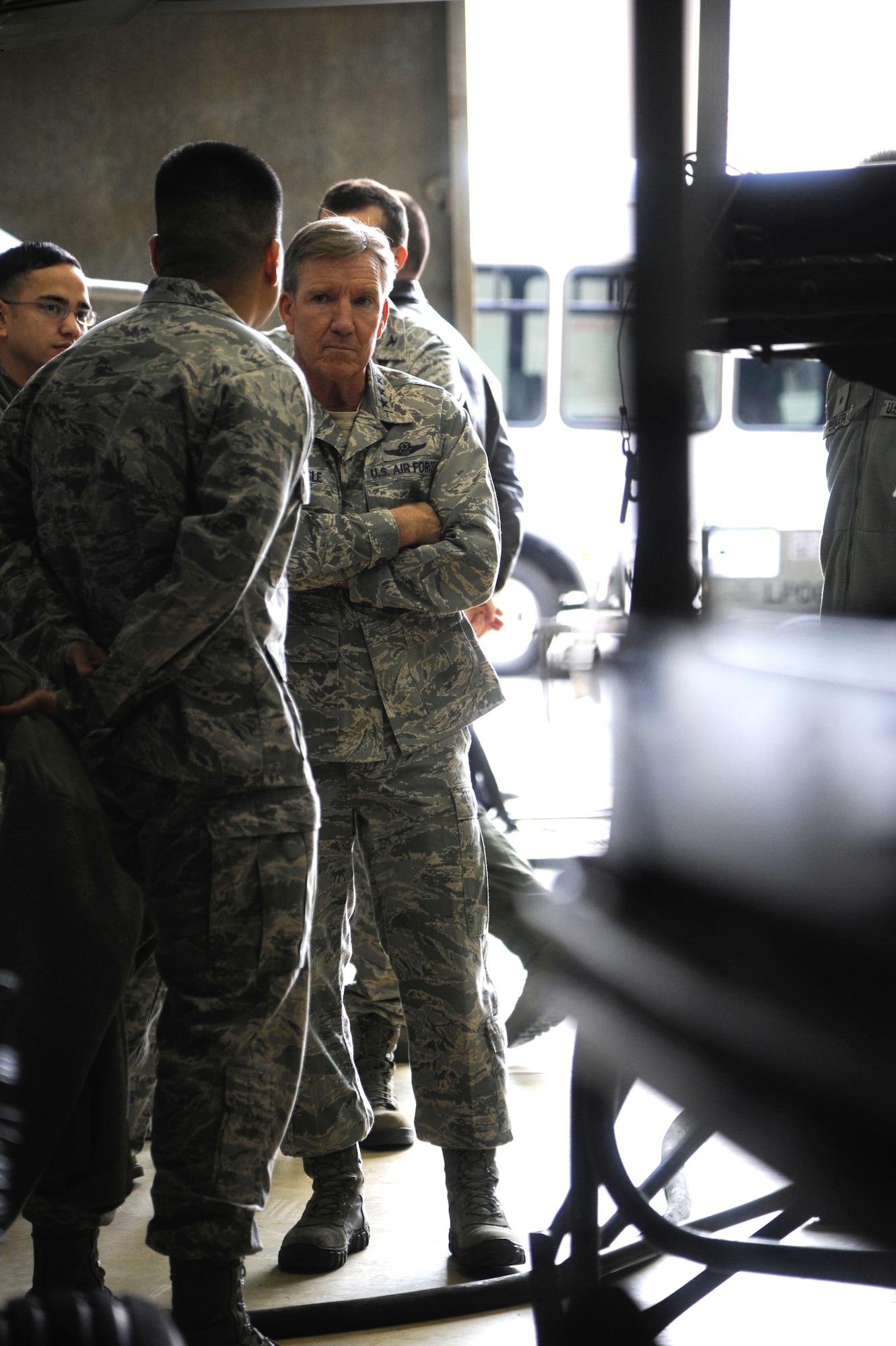 General Hawk Carlisle, Pacific Air Forces commander, is briefed by Maj. Christopher Cullen, 8th Aircraft Maintenance Squadron commander, on key issues concerning the health of the 8th Fighter Wing’s F-16 Fighting Falcon fleet, during his visit to Kunsan Air Base, Republic of Korea, Jan. 24, 2014. The general visited Kunsan to learn more about the base’s mission and capabilities as well as to thank the Airmen for everything they do here. (U.S. Air Force photo by Staff Sgt. Jessica Haas/Released)