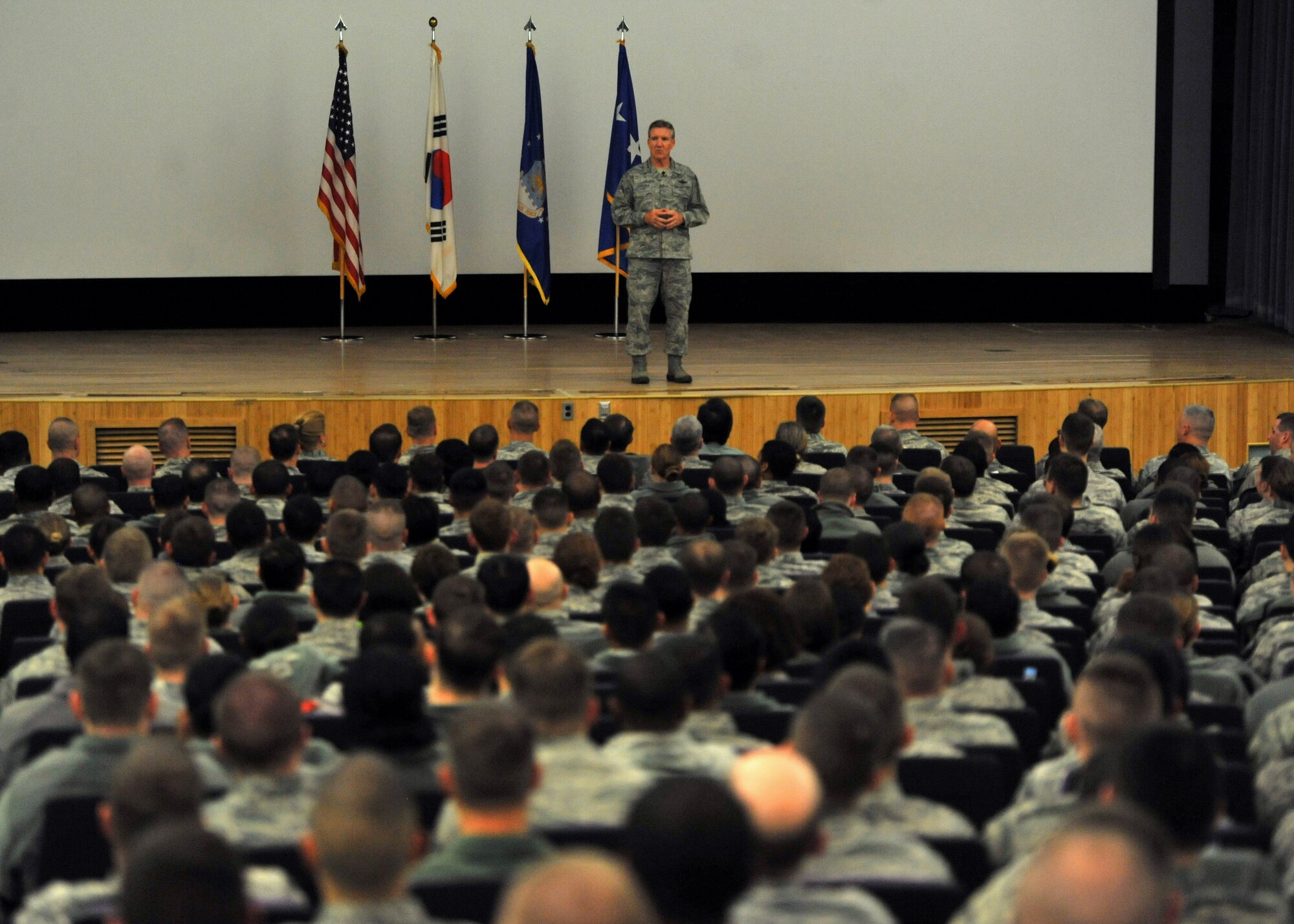 Gen. Hawk Carlisle, Pacific Air Forces commander, speaks to Team Osan members during an all-call at Osan Air Base, Republic of Korea, Jan. 23, 2014. During the all-call, Carlisle spoke about force management and the way forward. (U.S. Air Force photo/Senior Airman Siuta B. Ika)