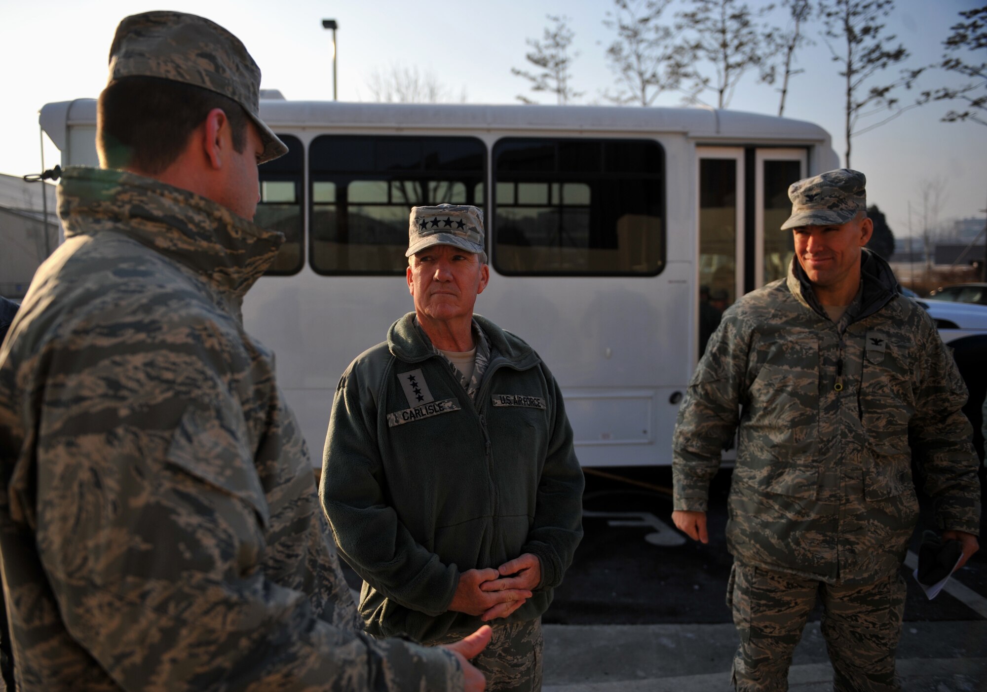 Gen. Hawk Carlisle, Pacific Air Forces commander, listens to a brief from Lt. Col. Chad Balettie, 51st Operations Support Squadron commander, at Osan Air Base, Republic of Korea, Jan. 23, 2014. During his tour of the 51st Operations Group’s facilities, Carlisle was taken to the airfield operations tower and given a brief on how Osan’s fighter squadrons would handle war and armistice execution. (U.S. Air Force photo/Senior Airman Siuta B. Ika)