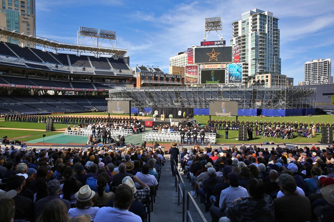 San Diego locals and service members from surrounding military bases honor Lt. Col. Jerry Coleman, a Marine veteran and baseball hall of famer, in PETCO Park at San Diego, Calif., Jan. 18. Marines and sailors with 1st Marine Logistics Group, 3rd Marine Air Wing, Marine Corps Recruit Depot San Diego and Marine Corps Air Station Miramar rendered military honors including an F/A-18E flyover, 21-gun salute and the playing of taps by a lone bugler to commemorate the World War II and Korean War veteran.