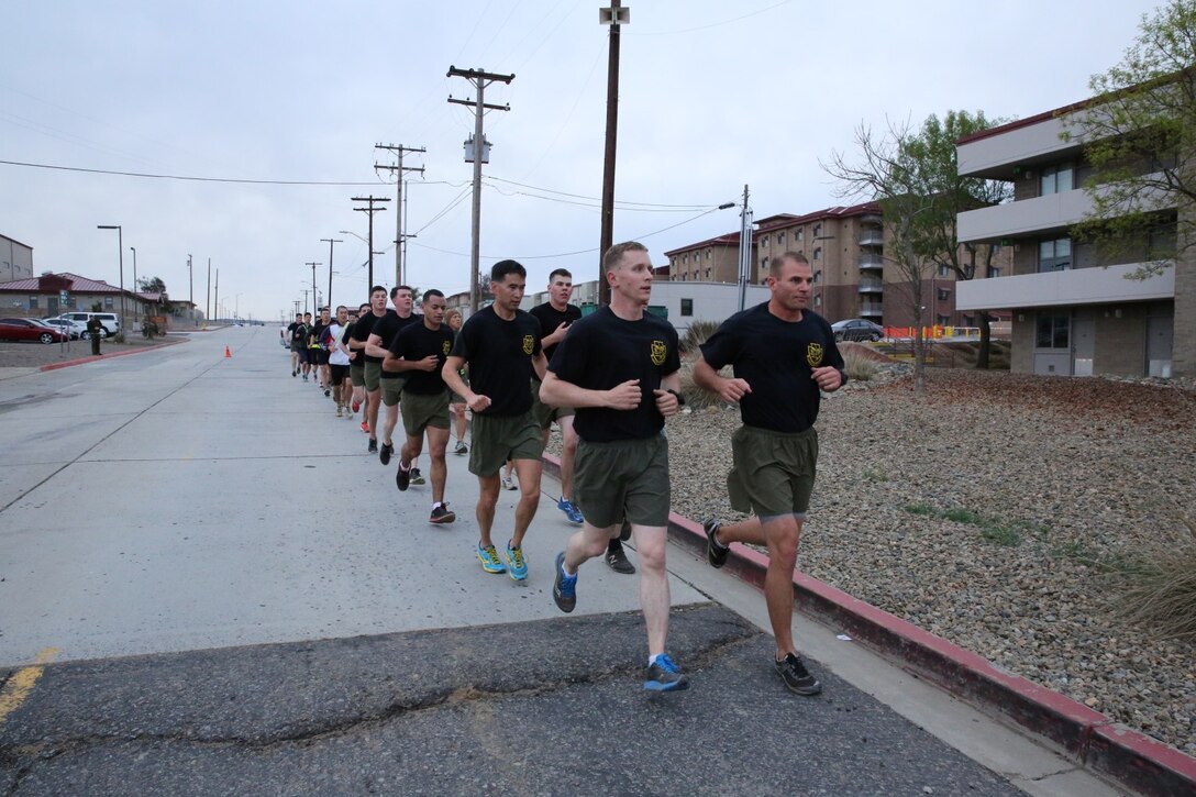 U.S. Marines from 1st Air Naval Gunfire Liaison Company and soldiers from the Japan Ground Self-Defense Force run for morning physical training during Exercise Iron Fist 2014 aboard Camp Pendleton, Calif., Jan. 24, 2014. Iron Fist 2014 is an amphibious exercise that brings together Marines and sailors from the 15th Marine Expeditionary Unit, other I Marine Expeditionary Force units, and soldiers from the JGSDF, to promote military interoperability and hone individual and small-unit skills through challenging, complex and realistic training. (U.S. Marine Corps photo by Lance Cpl. Anna K. Albrecht/Released)
