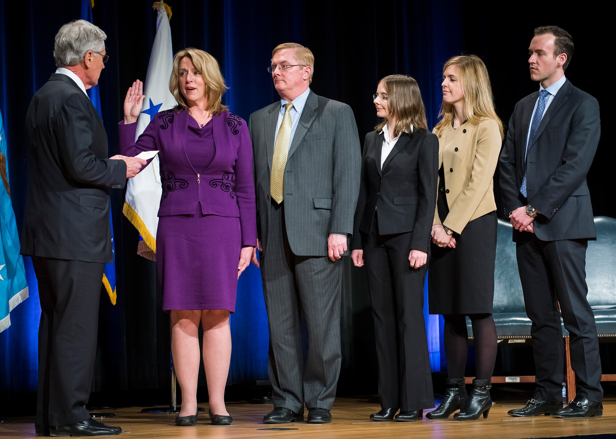 Defense Secretary Chuck Hagel, left, ceremoniously swears in Deborah Lee James, second from left, as the 23rd secretary of the Air Force, as her family looks on during a ceremony in the Pentagon, Washington, D.C., Jan. 24, 2014. James pledged to leave the Air Force some years from now on a path toward greater capability and better affordability. (U.S. Air Force photo/Jim Varhegyi)