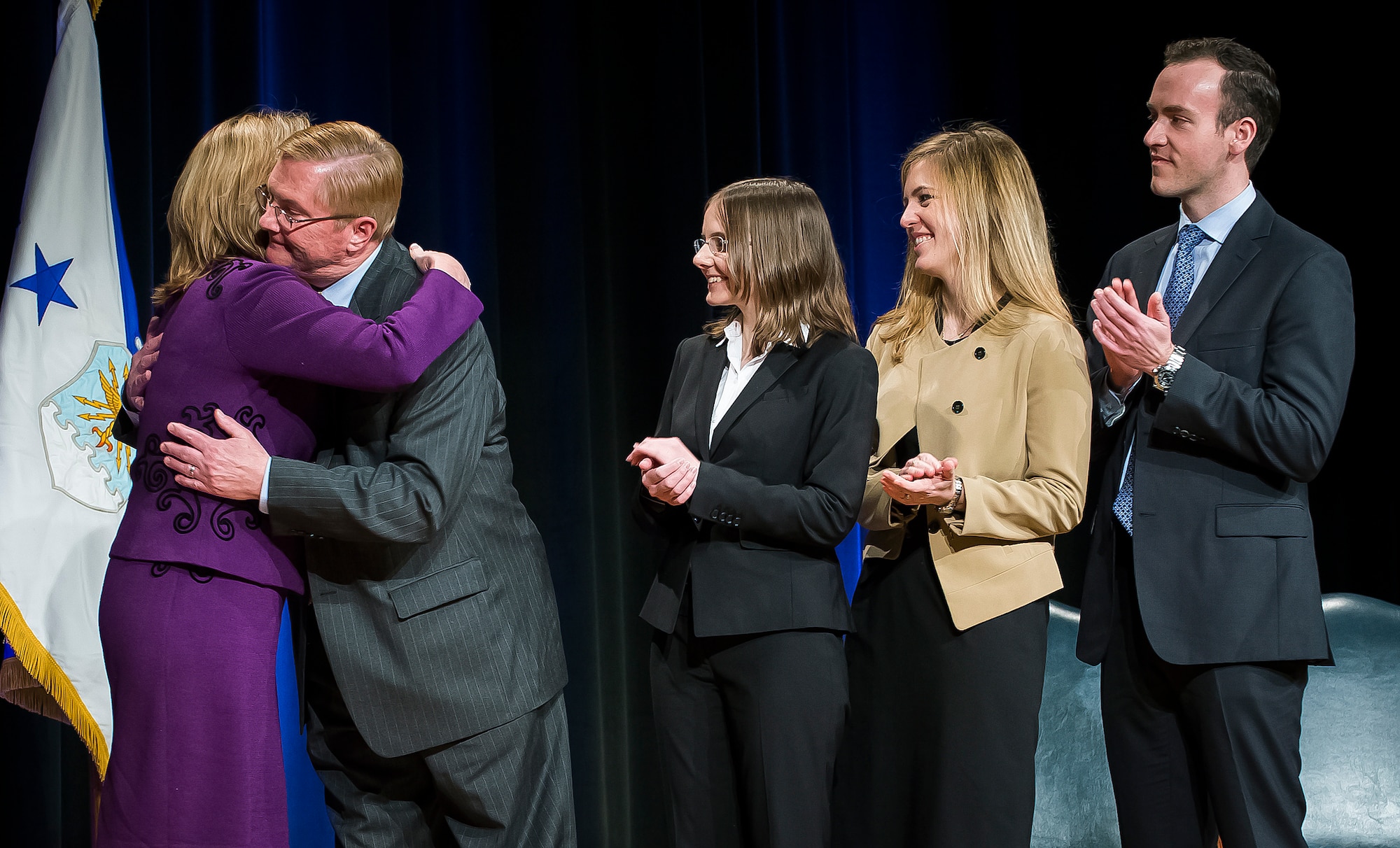 Deborah Lee James, the 23rd secretary of the Air Force, is congratulated by members of her family after being ceremoniously sworn in by Defense Secretary Chuck Hagel during a ceremony in the Pentagon, Washington, D.C., Jan. 24, 2014. James pledged to leave the Air Force some years from now on a path toward greater capability and better affordability. (U.S. Air Force photo/Jim Varhegyi)