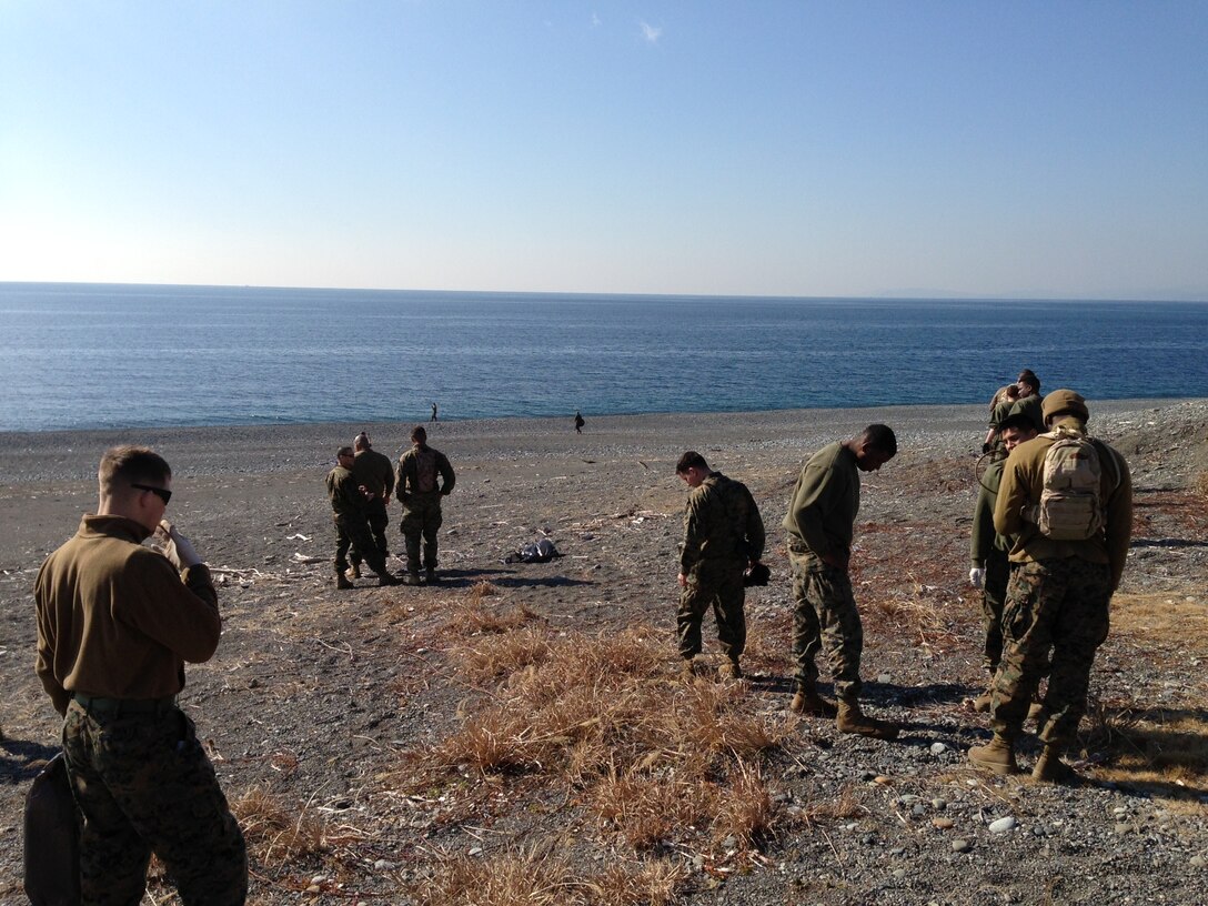 Fuji personnel clean up Numazu Beach.
