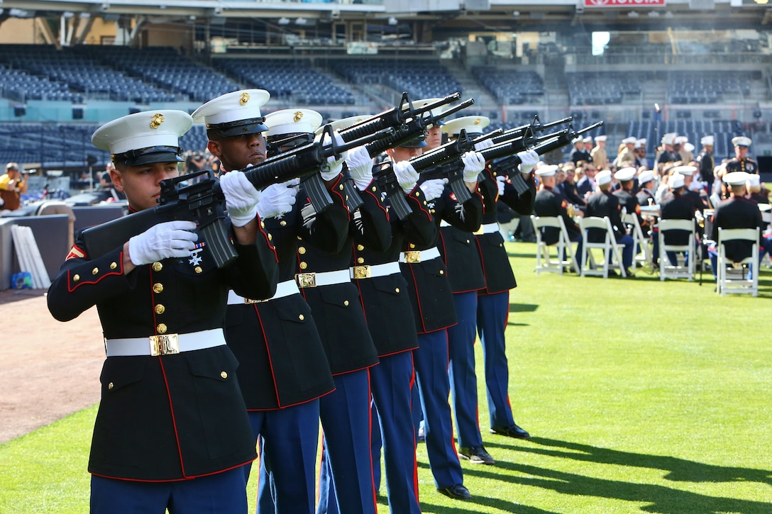 Marines with Marine Corps Air Station Miramar, perform a 21-gun salute during a memorial service for Lt. Col. Jerry Coleman at PETCO Park in San Diego, Calif., Jan. 18. To commemorate the life of the baseball hall of famer and Marine veteran, service members with 1st Marine Logistics Group, 3rd Marine Air Wing, Marine Corps Recruit Depot San Diego and MCASM rendered military honors including an F/A-18E flyover, 21-gun salute and the playing of taps by a lone bugler. 