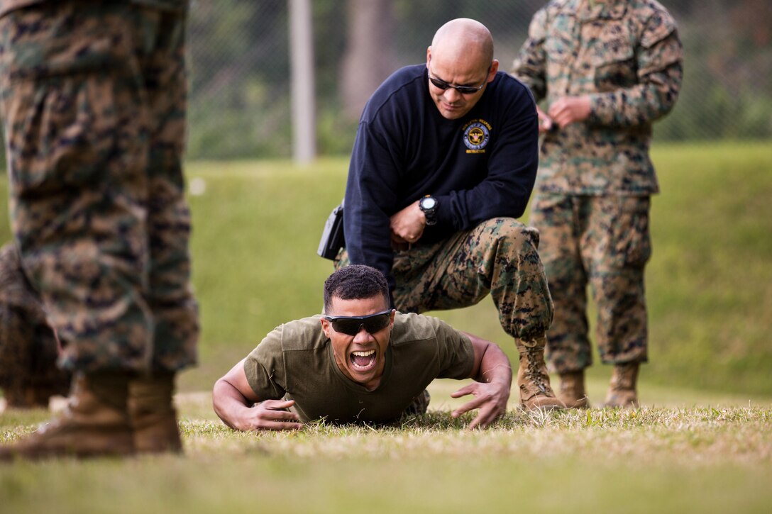 Gunnery Sgt. Alexander H. Orellana, a non-lethal weapons instructor and native of New York City, fires the X26 Taser into the leg of Private First Class Luis E. CruzLopez, a food service specialist with Golf Battery, Battalion Landing Team 2nd Battalion, 5th Marines, 31st Marine Expeditionary Unit, and a native of New York City, during the culminating event of the unit’s public disorder and non-lethal weapons employment training here, Jan. 24. Marines experience the Taser in order to understand the effects of the weapon and ensure it is only used when necessary. One of the secondary missions of Golf Battery is to serve as a non-lethal contingency force for the 31st MEU, useful in embassy security reinforcement, humanitarian operations and many other contingencies. The 31st MEU is the Marine Corps’ force in readiness for the Asia-Pacific region and the only continuously forward-deployed MEU.


