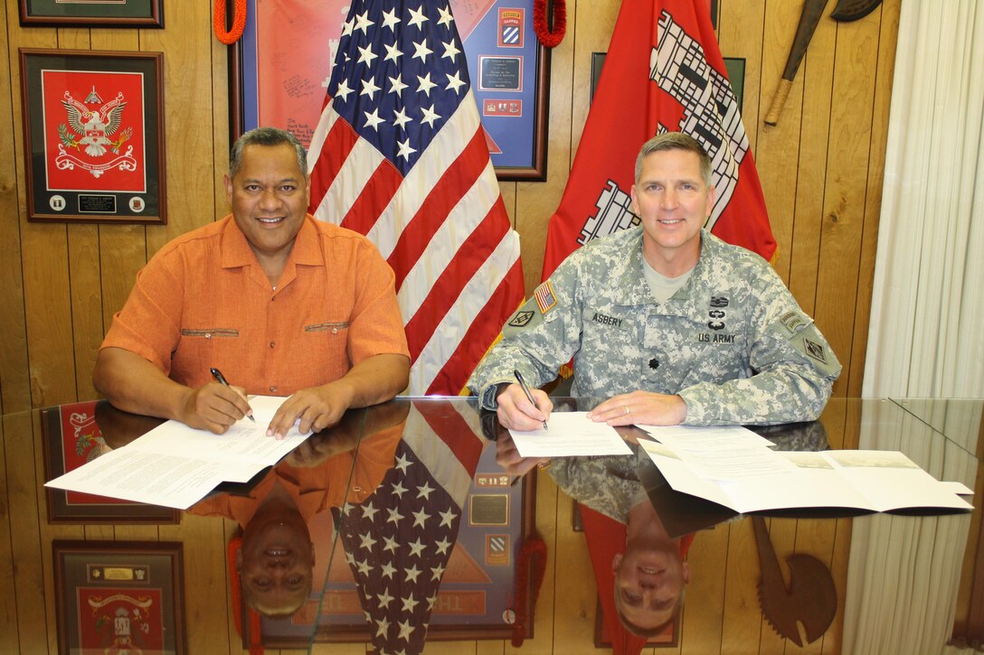 The Honolulu District and the government of American Samoa signed a Memorandum of Agreement Jan. 2 to formalize a partnership for the Corps to sponsor STEM activities in American Samoa schools. The goal is to advance science, technology, engineering and math education in local schools. This partnership aligns with the focus of the White House, Department of Education, and the Chief of Engineers to prepare students for STEM careers in the 21st Century global economy. Representing the Corps was District Commander Lt. Col. Thomas D. Asbery. Representing American Samoa was Lt. Gov. Lemanu Peleti Mauga. 