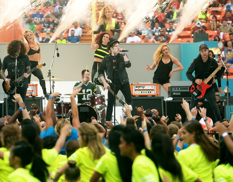 Rock band Fall Out Boy performs during the 2014 Pro Bowl Halftime Show at Aloha Stadium in Honolulu, Hawaii, Jan. 26, 2014. The band performed their hits “My Songs Know What You Did In The Dark (Light Em Up)” and “Sugar, We’re Goin Down.” The Pro Bowl featured the National Football League’s top players from the 2013-2014 season. Team Rice escaped the game with a win over Team Sanders after Carolina Panther’s Mike Tolbert ran in the game-winning two-point conversion with seconds left in the game. (U.S. Air Force photo/Staff Sgt. Alexander Martinez)