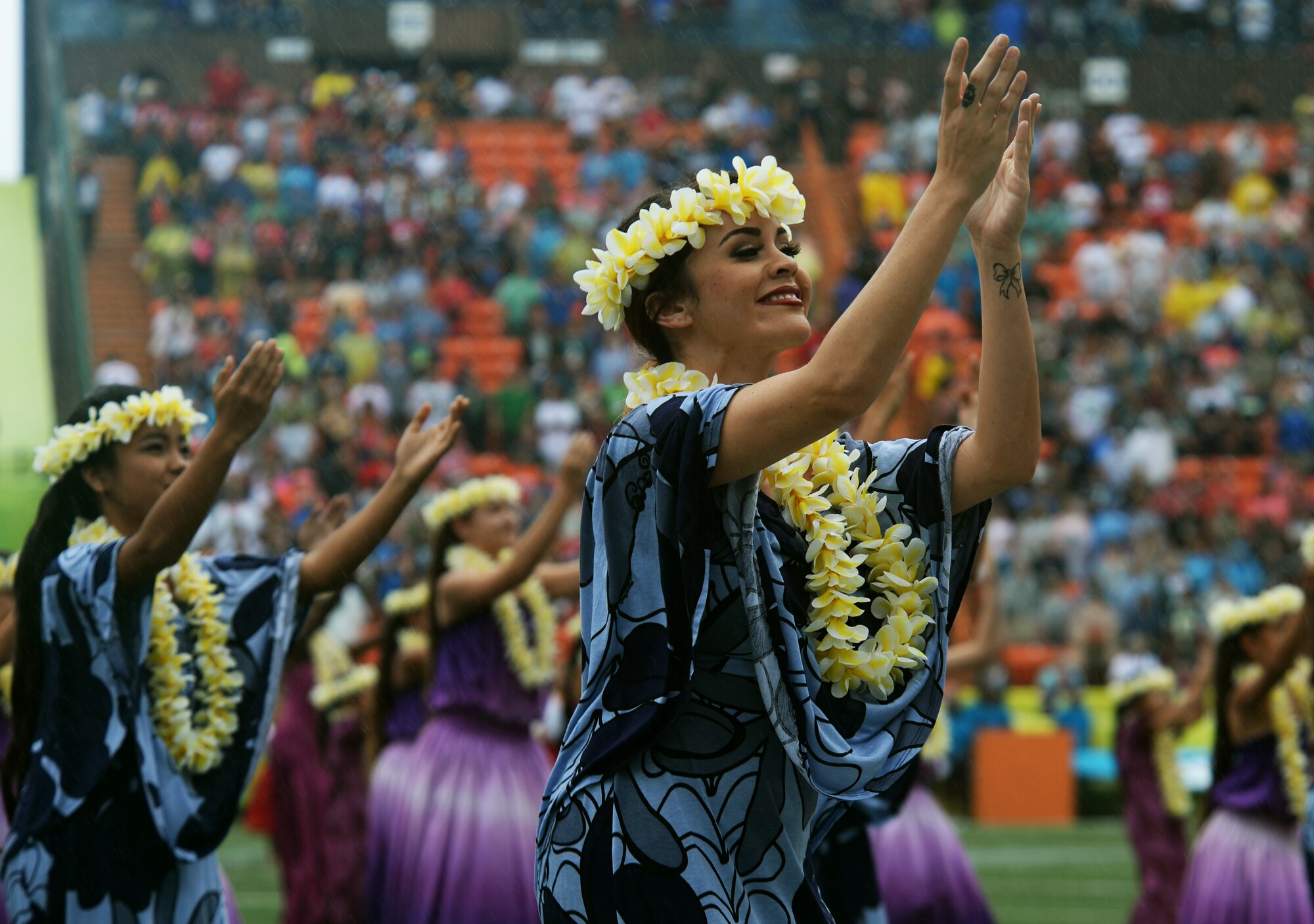 Traditional Hawaiian dancers perform during the 2014 Pro Bowl pregame events at Aloha Stadium in Honolulu, Hawaii, Jan. 26, 2014. The Pro Bowl featured the National Football League’s top players from the 2013-2014 season. Team Rice escaped the game with a win over Team Sanders after Carolina Panther’s Mike Tolbert ran in the game-winning two-point conversion with seconds left in the game. (U.S. Air Force photo/Staff Sgt. Alexander Martinez) 