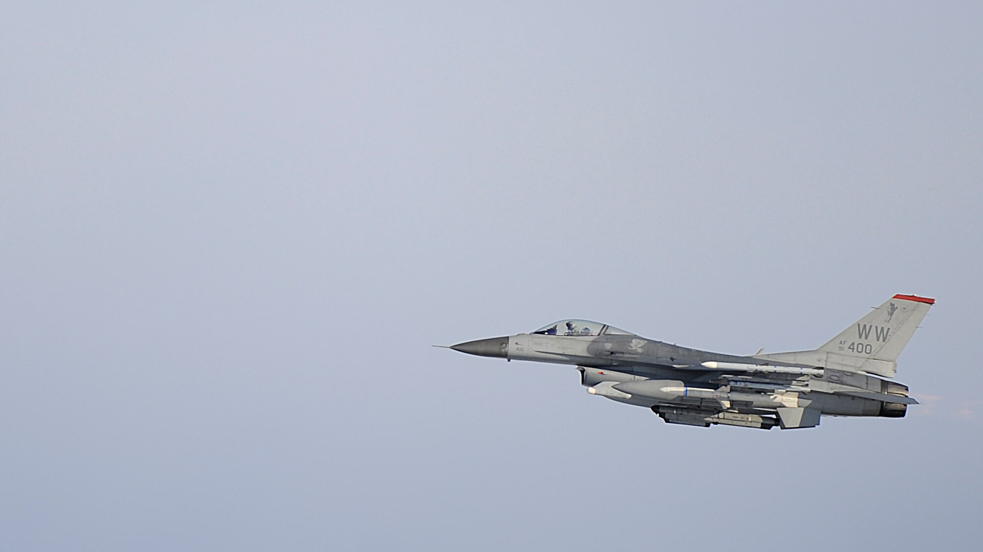 An F-16 Fighting Falcon from the 13th Fighter Squadron takes flight during an operational readiness exercise at Misawa Air Base, Japan, Jan. 27, 2014. Both the 13 and 14 FS fly sorties during the exercise to demonstrate their response capabilities. (U.S. Air Force photo/Airman 1st Class Patrick S. Ciccarone)