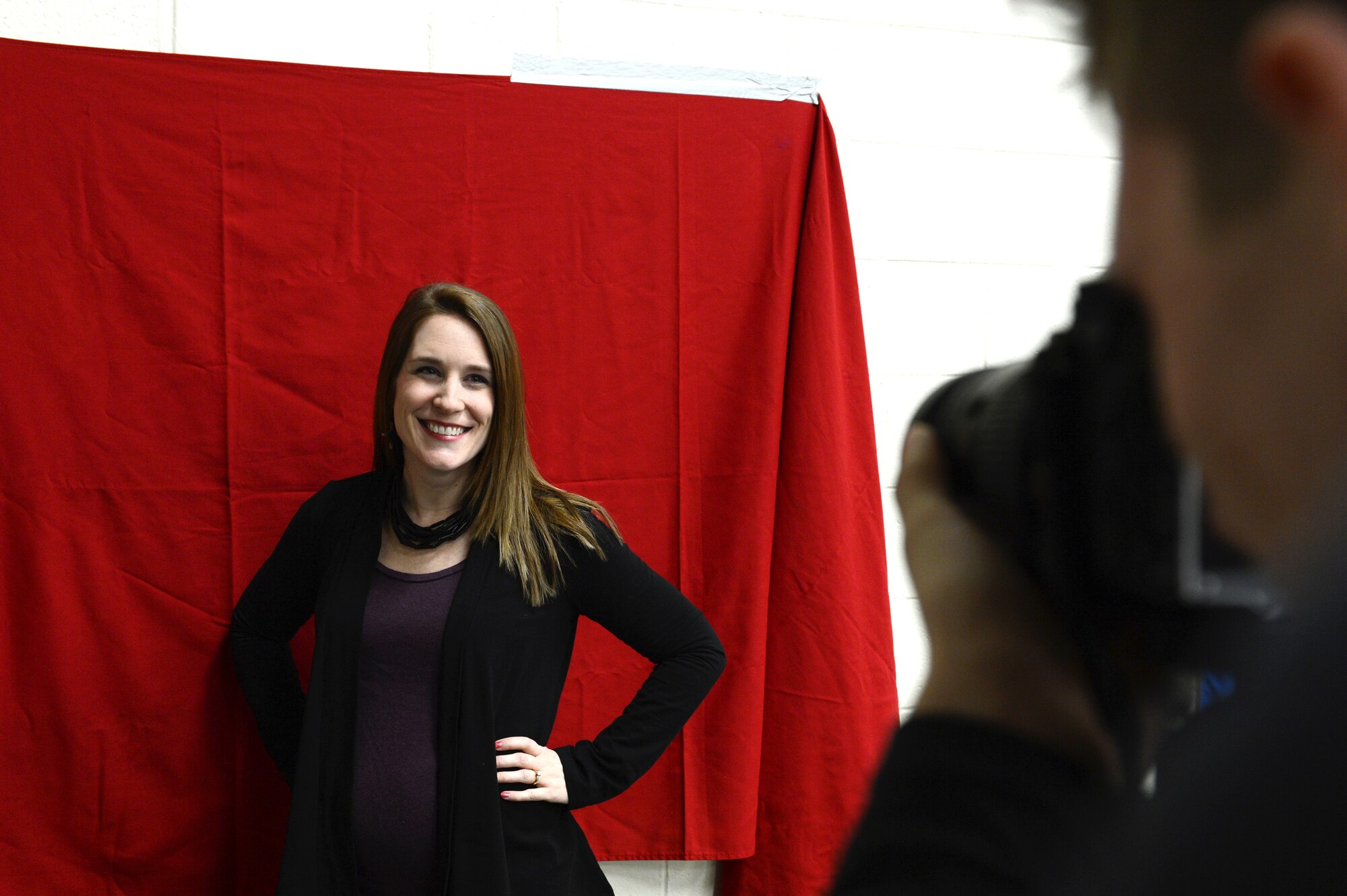 Laura Breau, wife of a deployed Airman, gets her glamour shot taken during a Hearts Apart event on Shaw Air Force Base, S.C., Jan. 24, 2014. Breau is one of the 25 spouses to get their picture taken during the event to send to their deployed husbands on Valentine’s Day. (U.S. Air Force photo by Airman 1st Class Diana M. Cossaboom/Released)