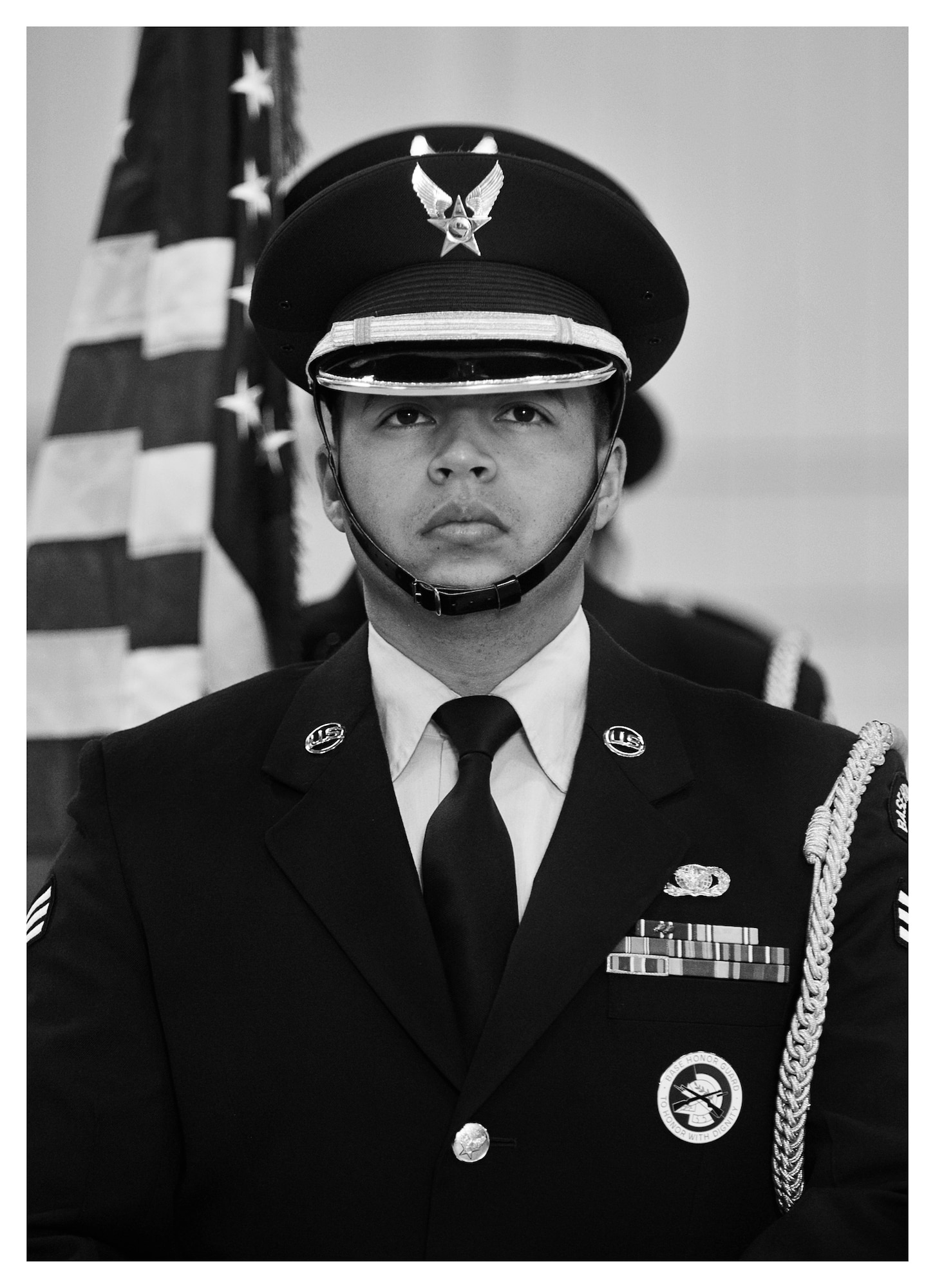 Senior Airman Mark Arriage, 325th Security Forces member prepares to lead the honor guard detail into position for the opening ceremony of a change of command, Dec. 20 at Tyndall. In 2013 the base honor guard participated in 80 official ceremonies with a drop in personnel from 59 to 32 members. (U.S. Air Force photo by Staff Sgt. Javier Cruz)
