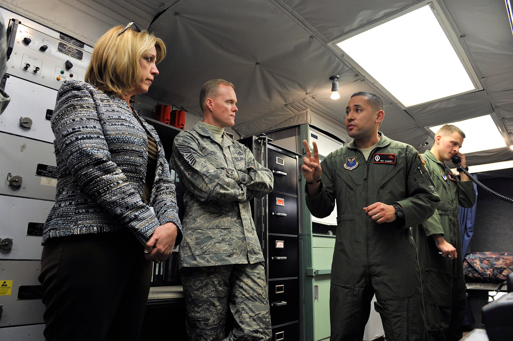 Secretary of the Air Force Deborah Lee James and Chief Master Sergeant of the Air Force James Cody receive an operations brief from missile combat crew commander 1st Lt. Reynaldo Cannet Jr., 12th Missile Squadron, while touring Missile Alert Facility India-01’s underground Launch Control Capsule January 21, 2014. India-01 is located near Great Falls, Mont., and is one of 15 MAFs assigned to the 341st Missile Wing. (U.S. Air Force photo by John Turner)