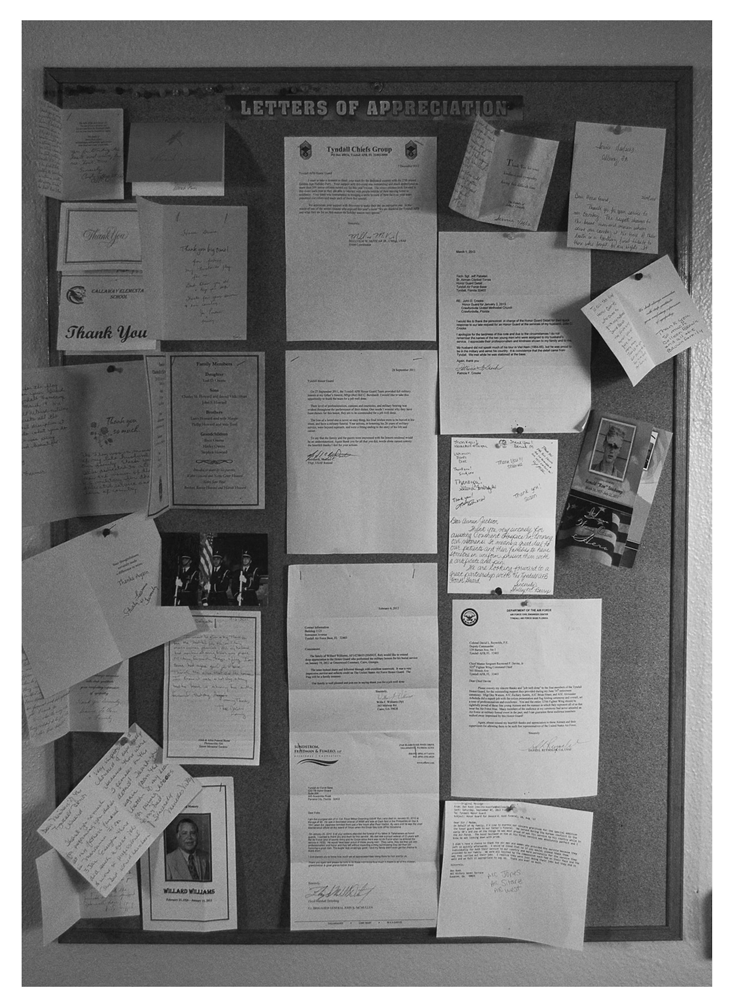 A message board covered with thank you notes from individuals and organizations greets visitors to the honor guard building, Dec. 18 at Tyndall. In 2013, the honor guard attended 190 funerals in 23 counties covering a total of 14,300 square miles. (U.S. Air Force photo illustration by Staff Sgt. Javier Cruz)