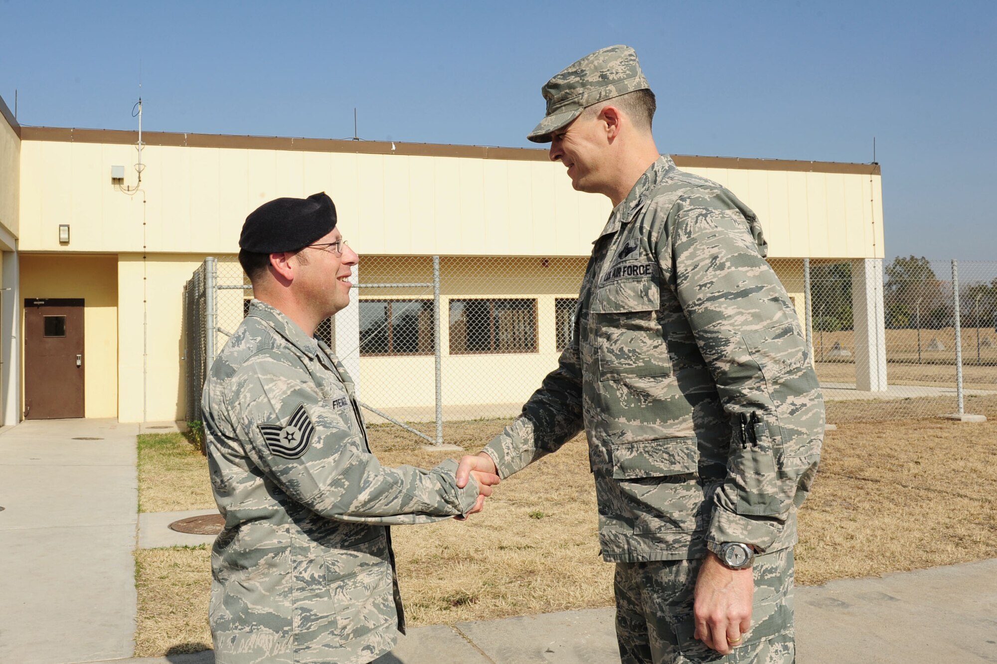 Tech. Sgt. Kenneth Fresquez, 39th Security Forces NCO in charge of the military working dog section, is awarded this week's "Pick of the 'Lik" Nov. 20, 2013, at Incirlik Air Base, Turkey. The 39th Air Base Wing leadership recognizes Airmen for demonstrating outstanding leadership and job performance abilities. (U.S. Air Force photo by Airman 1st Class Nicole Sikorski/Released) 