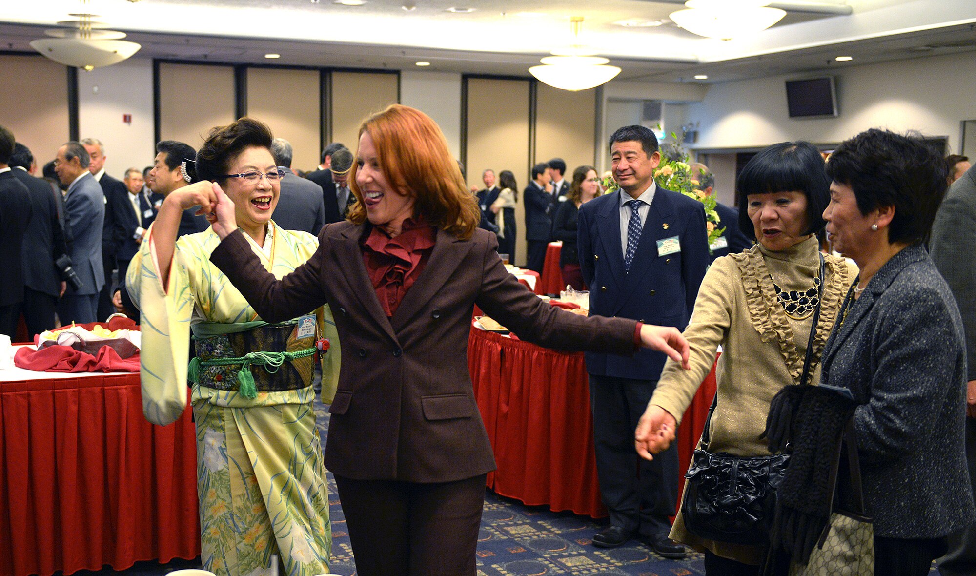 Celebrants perform the Mamba during the annual New Year’s party at Yokota Air Base, Japan, Jan. 25, 2014. The annual party is an opportunity to renew the bonds of friendship with the local community leaders. (U.S. Air Force photo by Airman 1st Class David Danford/Released)
