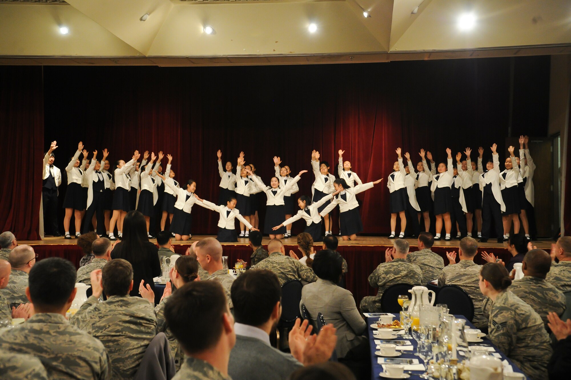 The Far East Broadcasting Company's Children's Choir performed at the National Prayer Breakfast Jan. 23, 2014, at Osan Air Base, Republic of Korea. The breakfast offered an opportunity for people of all faiths to unite in wishing for the continued partnership between the United States and Republic of Korea. (U.S. Air Force photo by Staff Sgt. Jake Barreiro)