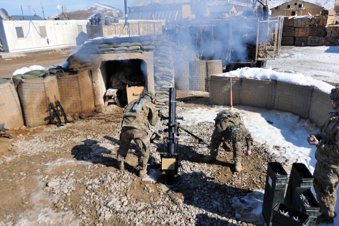 U.S. soldiers fire their 120mm mortars during a live-fire exercise on Forward Operating Base Lightning in Afghanistan's Paktia province, Jan. 17, 2014.