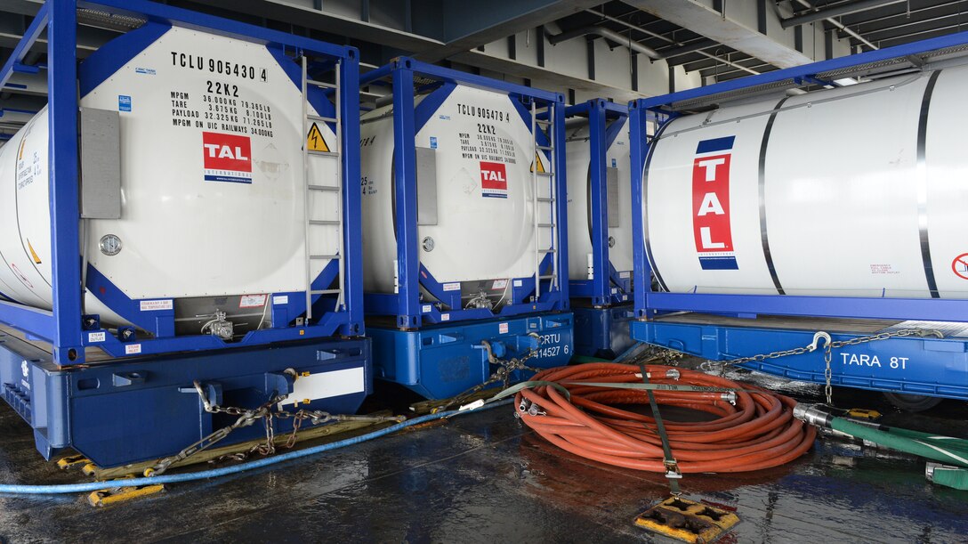Containers of bleach reagents sit aboard the container ship MV Cape Ray in the Atlantic Ocean off the coast of Virginia, Jan. 11, 2014. The bleach reagents break down chemical agents. 