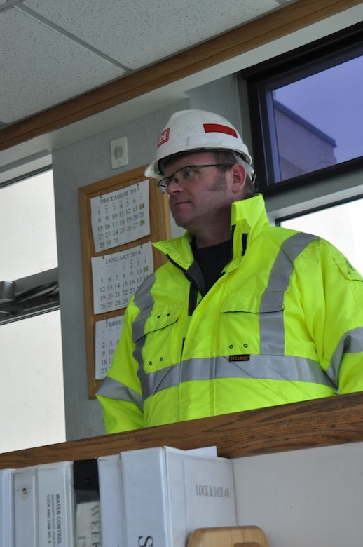 Scott Uhl, U.S. Army Corps of Engineers, St. Paul District, maintenance and repair section supervisor, monitors work at Lock and Dam 8, near Gonoa, Wis., Jan. 14. The Corps is currently dewatering the lock to perform major maintenance on the lock gates, concrete and bubbler systems. 