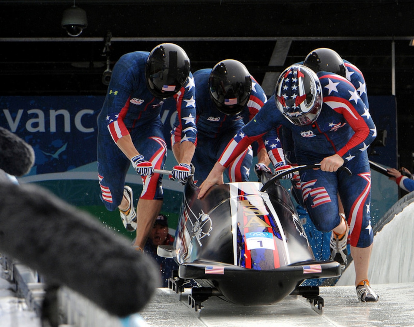 Former U.S. Army World Class Athlete Program bobsledder Steven Holcomb (front right) leads "The Night Train" team of WCAP Sgt. Justin Olsen, Steve Mesler and Curtis Tomasevicz to a start time of 4.77 seconds in the third heat of the Olympic four-man bobsled event. The quartet won an Olympic gold medal in bobsleigh for Team USA for the first time in 62 years at the Whistler Sliding Centre during the 2010 Olympic Winter Games. Nine Soldiers have been named to the 2014 Sochi Winter Olympics including Sgt Justin Olsen pictured here.  U.S. Army photo by Tim Hipps, IMCOM G9 MWR Public Affairs