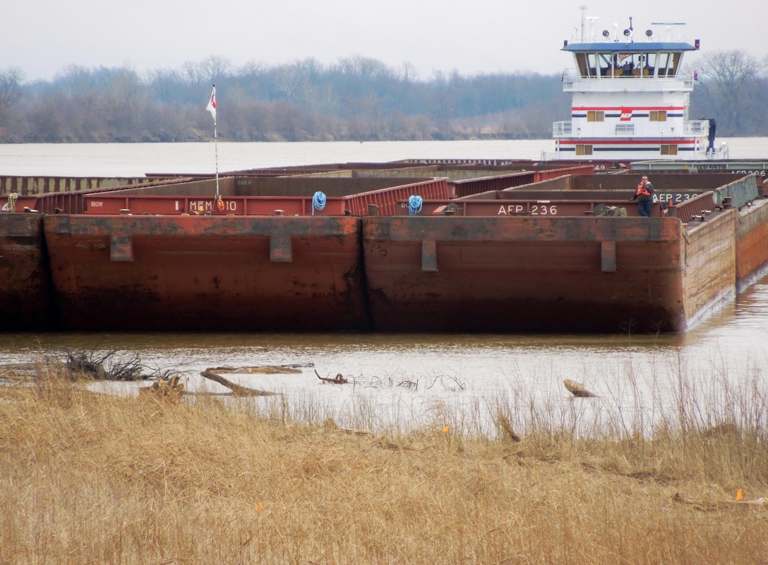 Strong winds caused this tow to miss the 600-foot lock chamber at J.T. Myers Locks and Dam, Mt. Vernon, Ind. 