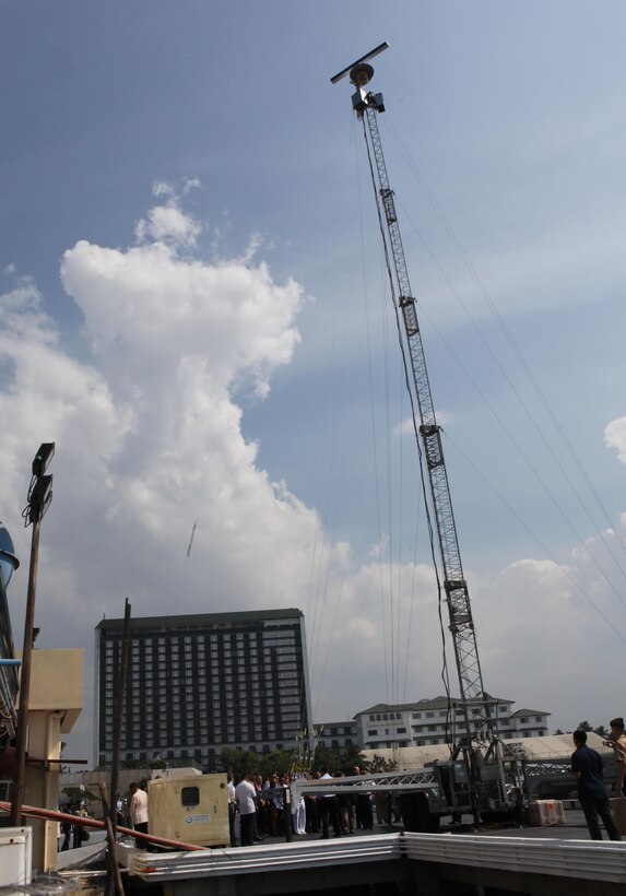 During the initial maritime domain awareness demonstration, the Maritime Persistent Surveillance Tower system operated from the Philippine Coast Guard Headquarters in Manila, Philippines, Jan. 27. The MPST is a land-based, mobile, multi-sensor payload platform that supports persistent 360-degree surveillance operations. The MPST detects and monitors surface contacts operating in the littorals, with various advanced sensors. The system is tailorable to meet specific requirements and mission parameters.