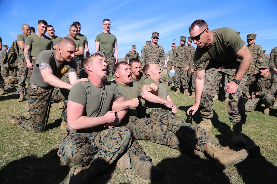 CAMP PENDLETON, Calif. - Marines with 2nd Battalion, 1st Marines, now part of the 11th Marine Expeditionary Unit, participate in taser familiarization and qualification as part of a non-lethal weapons course here Jan. 27. In order to use the non-lethal tools utilized by the Marine Corps, Marines must experience each non-lethal weapon first hand. The first part of familiarizing Marines with the taser was to be shot with the taser under controlled conditions.
