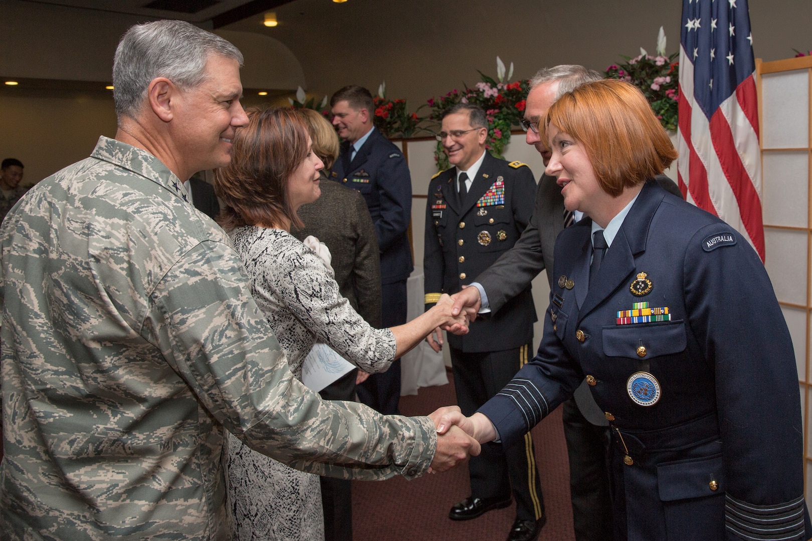 (Left to right) U.S. Air Force Lt. Gen. Sam Angelella, the commander of U.S. Forces Japan and the 5th Air Force, greets Royal Australia Air Force Group Captain Barbara Courtney, United Nations Command (Rear) commander, after the UNC (Rear) change of command ceremony at Yokota Air Base, Japan, Jan. 28, 2014. As the United Nations Command’s principal representative in Japan, the UNC (Rear) maintains the status of forces agreement regarding United Nations Forces in Japan during armistice conditions. (U.S. Air Force photo by Osakabe Yasuo/Released)