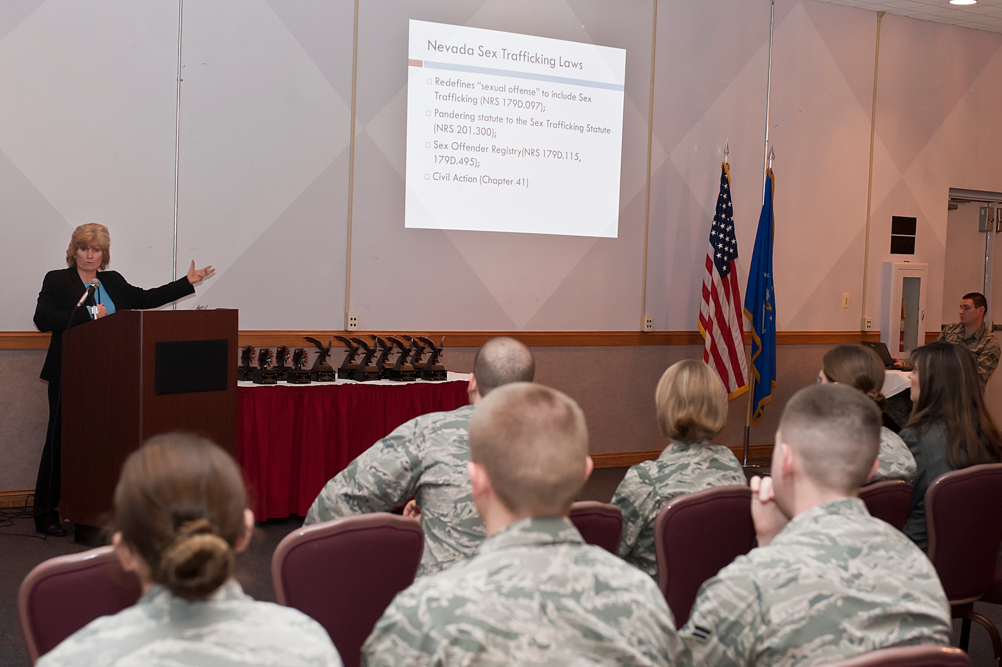 Gwendolyn Pascoe, Las Vegas Metropolitan Police Department Southern Nevada Human Trafficking Task Force director, gives a human trafficking brief to the 99th Communications Squadron during their commander’s call at the Desert Oasis Jan. 27, 2014, at Nellis Air Force Base, Nev. The Las Vegas Metropolitan Police Department recovered 2,229 victims of sex trafficking since 1994. Additionally, Metro PD recovered 107 children victimized by human traffickers just last year. (U.S. Air Force photo by Senior Airman Matthew Lancaster)