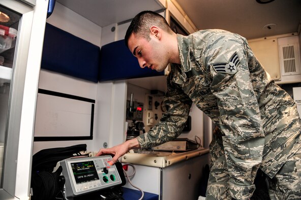 Senior Airman Jeremy Anderson, 354th Medical Operations Squadron ambulance crew member, tests equipment during a change-of-shift checklist procedure Jan. 24, 2014, Eielson Air Force Base, Alaska. As an ambulance crew member, Anderson performs 24-hour on-call shifts and must respond to any emergency that arises on base. (U.S. Air Force photo by Senior Airman Zachary Perras/Released)