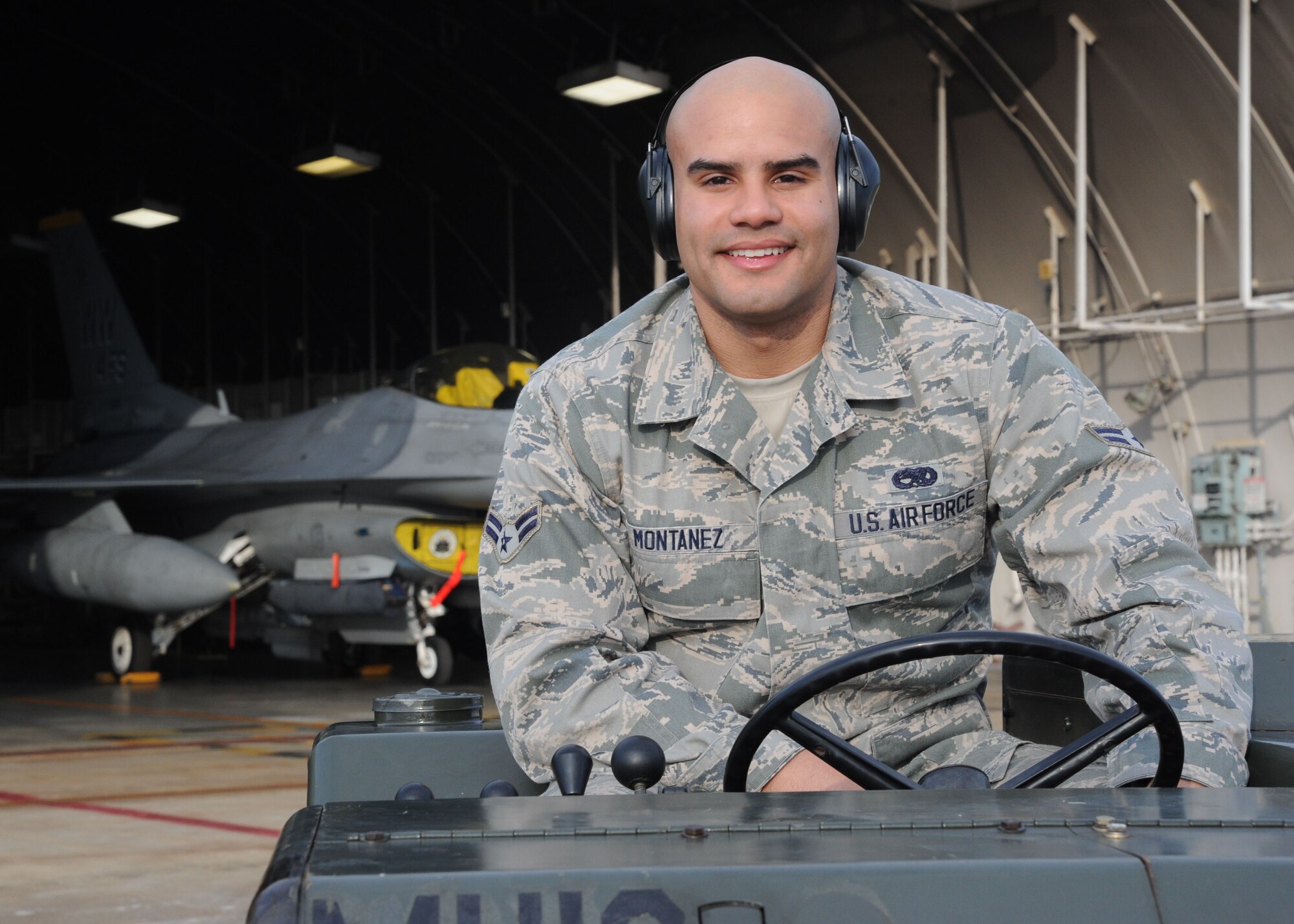 Airman 1st Class Julian A. Montanez, 14th Aircraft Maintenance Unit aircraft armament systems apprentice, is the Wild Weasel of the Week at Misawa Air Base, Japan, Jan. 27, 2014. As an aircraft armament systems apprentice, Montanez is responsible for sending F-16 Fighting Falcoln out weapons ready. (U.S. Air Force photo/Staff Sgt. Alyssa C. Wallace)