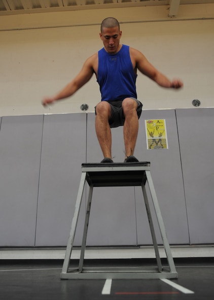 U.S. Air Force Senior Airman Manuel Terrazas, 7th Logistics Readiness Squadron, performs a box jump Jan. 24, 2014, at Dyess Air Force Base, Texas. Terrazas competed in this year’s first Warrior Challenge and finished second with a time of 24:16. (U.S. Air Force photo by Senior Airman Shannon Hall/Released)