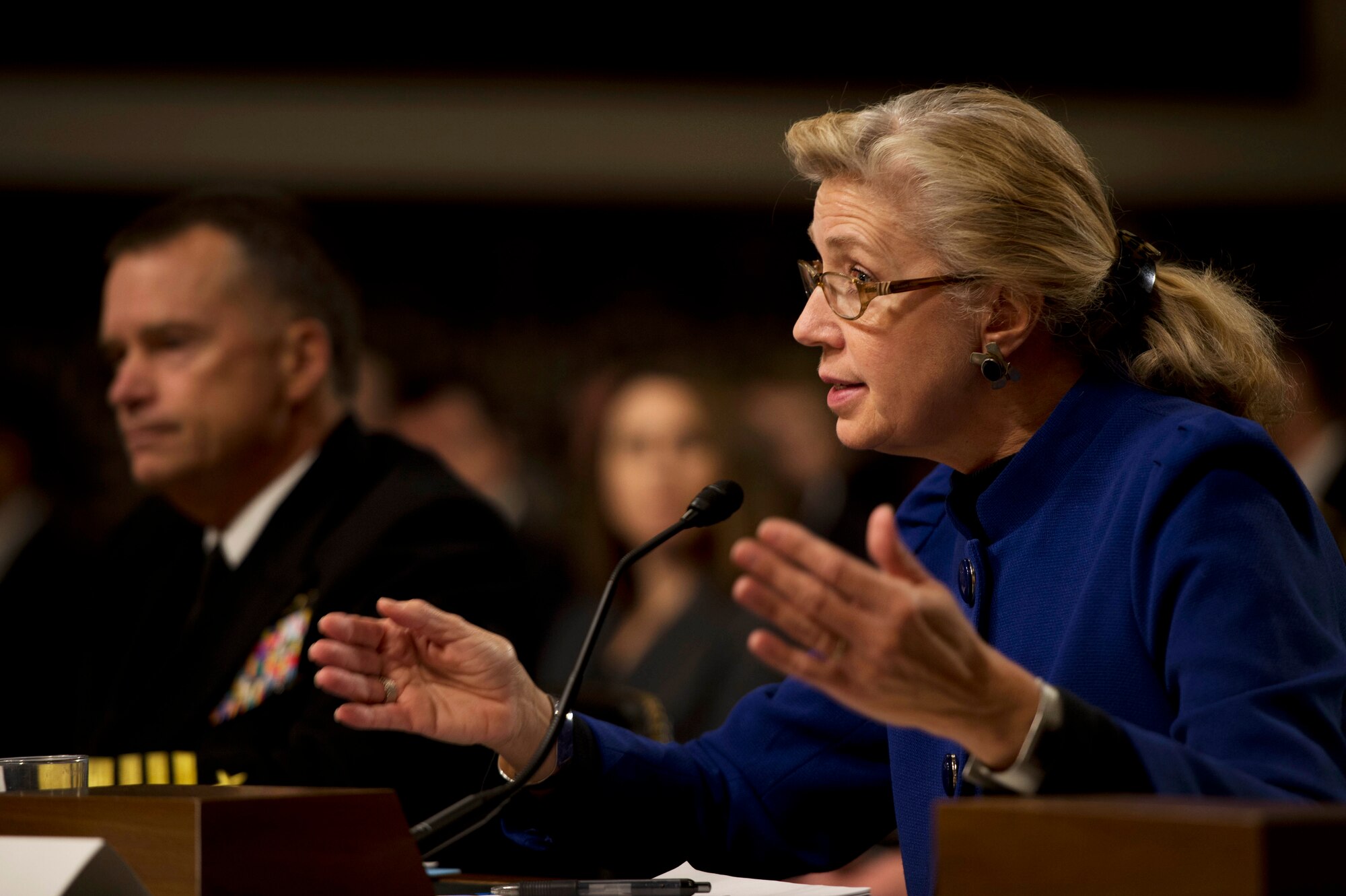 Acting Deputy Defense Secretary Christine H. Fox answers a question as Navy Adm. James A. Winnefeld Jr., vice chairman of the Joint Chiefs of Staff, listens during testimony before the Senate Armed Services Committee in Washington on Jan. 28, 2014. Fox and Winnefeld addressed the current budget environment and the possible requirement to slow the rate of growth in military compensation. (DOD photo/Erin A. Kirk-Cuomo) 