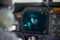A crew chief from the 5th Aircraft Maintenance Squadron sits in the cockpit of a B-52H Stratofortress during a one-on-one training session with Tech. Sgt. Christopher Ramsauer, 372nd Training Squadron Detachment 22 crew chief instructor at Minot Air Force Base, N.D., Jan. 23, 2013. Training is conducted daily and class sizes range from as few as one to ten students. (U.S. Air Force photo/Senior Airman Brittany Y. Auld)