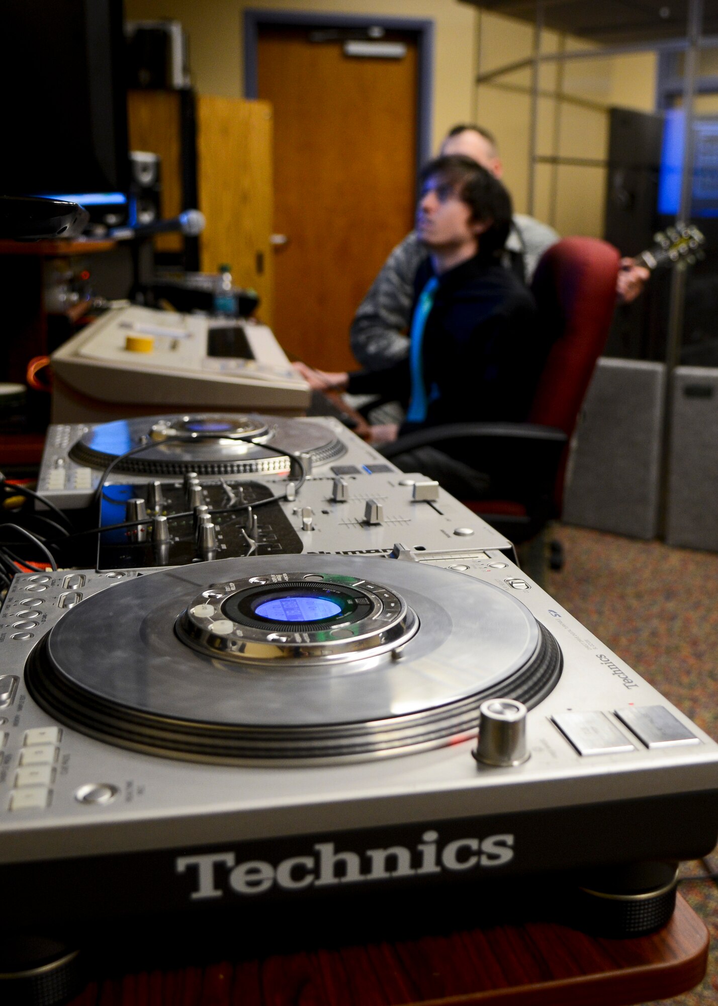 The Langley Community Commons at Langley Air Force Base, Va., features rooms dedicated to music, including piano, guitar and a recording station. The facility commons opened its doors on Friday Jan. 24, 2014, with a ribbon-cutting ceremony. (U.S. Air Force photo by Airman 1st Class Victoria H. Taylor/Released)