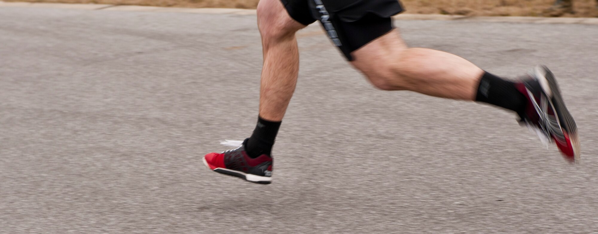 Staff Sgt. Christopher Hollowood, 901st Special Operations Aircraft Maintenance Sqaudron supply support journeyman, runs a 40-meter dash during the King and Queen of the Gym at Hurlburt Field, Fla., Jan. 24, 2014. The competitors participated in multiple exercises in beginner and advanced categories. (U.S. Air Force photo/Senior Airman Krystal M. Garrett)