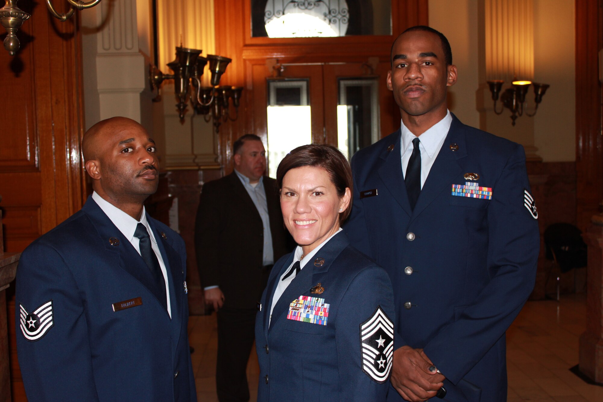 Tech. Sgt. Justin Tolbert, personnel customer service manager, Chief Master Sgt. Ruthe Flores, Air Reserve Personnel Center command chief and Staff Sgt. Sean Cooper, retirements service team technician, attended the Colorado Military and Veterans Appreciation Day at the Colorado Capitol in Denver Jan. 27, 2014. (U.S. Air Force photo/Tech. Sgt. Rob Hazelett)
