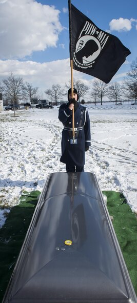 A member of the U.S. Air Force Honor Guard stands vigil following retired Brig. Gen. Robinson "Robbie" Risner's military funeral at Arlington National Cemetery in Virginia on Jan. 23, 2014. Risner was the Air Force's 20th Ace and survived seven and a half years of captivity as a prisoner of war in Hoa Lo Prison, aka the Hanoi Hilton during the Vietnam War. (U.S. Air Force photo/Jim Varhegyi)

