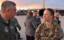 Lt. Col. Joey Dible, right is greeted by 52nd Airlift Squadron Commander Lt. Col. Jason Terry upon her return to Peterson Air Force Base, Colo. on Jan. 15, 2014. Dible served as the 52nd Expeditionary Airlift Squadron Commander leading approximately 30 Airmen and the squadron’s C-130 airlift missions in support of Combined Joint Task Force-Horn of Africa, based at Camp Lemonnier, Djibouti, Africa. Dible, a C-130 master navigator and the director of staff is assigned to the Peterson-based 52nd Airlift Squadron. (U.S. Air Force photo//Master Sgt. Daniel Butterfield)