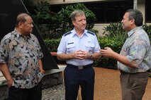 Gen. Hawk Carlisle, Pacific Air Forces commander, listens to Gov. Eddie Calvo (left), the Governor of Guam, and Gov. Eloy Inos, the Governor of the Commonwealth of the Northern Mariana Island, at the Courtyard of Heroes, Joint Base Pearl Harbor-Hickam, Hawaii Jan. 27, 2014. The visit focused on the mission and roles of PACAF and the rebalance to the Pacific. (U.S. Air Force photo/Master Sgt. Matthew McGovern)  