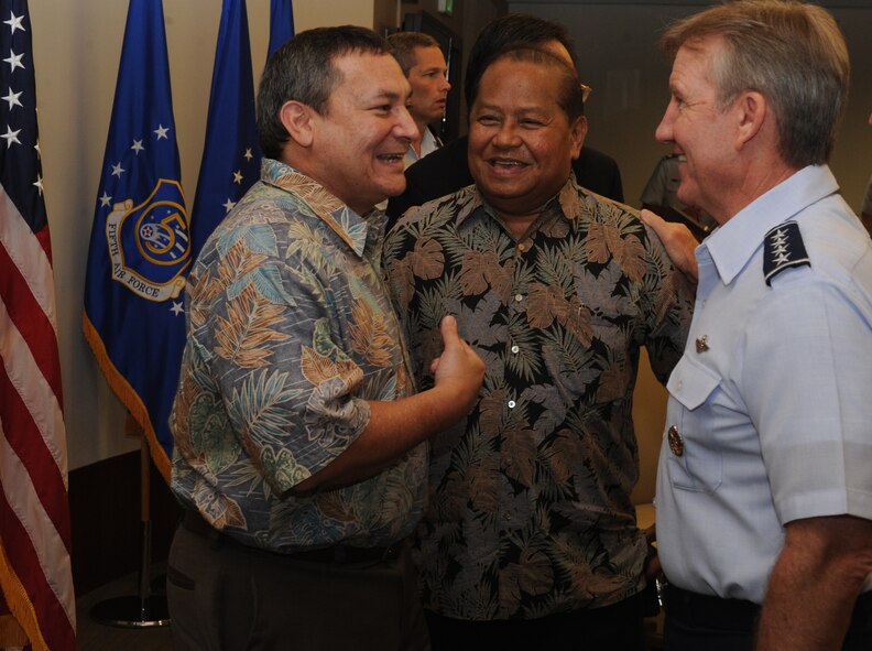 Gen. Hawk Carlisle, Pacific Air Forces commander, talks with Gov. Eddie Calvo (left), the Governor of Guam, and Gov. Eloy Inos, the Governor of the Commonwealth of the Northern Mariana Island, at Joint Base Pearl Harbor-Hickam, Hawaii Jan. 27, 2014. The visit focused on the mission and roles of PACAF and the rebalance to the Pacific. (U.S. Air Force photo/Master Sgt. Matthew McGovern)  