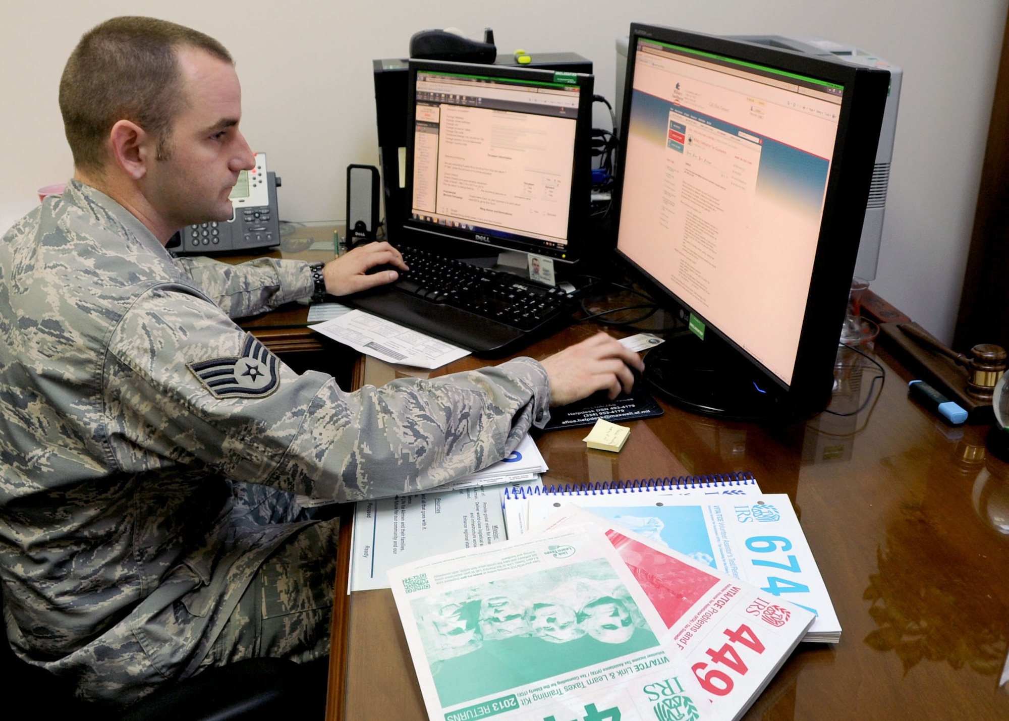 INCIRLIK AIR BASE, Turkey -- Staff Sgt. James Dorris, 39th Air Base Wing Legal Office, NCO in-charge of general law, searches through the Military OneSource website for information on free online tax services for military members.  The Incirlik Tax Resource Center is available Feb. 10 to April 19, 2014, Mondays through Thursdays, from 8 a.m. to noon to the Incirlik community with tools needed for filing federal and state tax returns. (U.S. Air Force photo by Staff Sgt. Veronica Pierce/Released)