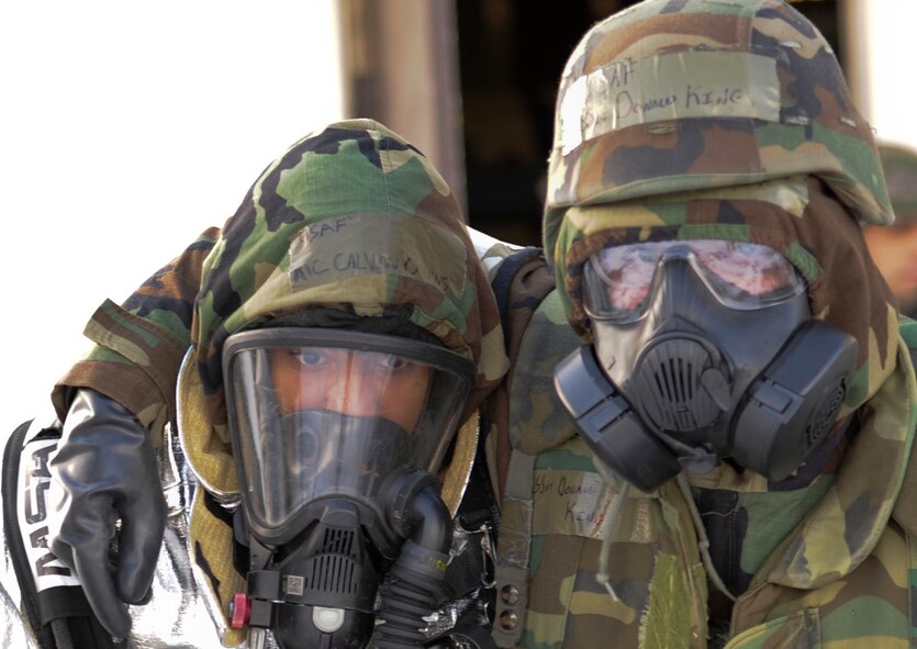 Airman 1st Class Calvin Owens, 35th Civil Engineer Squadron firefighter, rescues Staff Sgt. Donald King, 35th Maintenance Squadron, from a simulated emergency during Phase II of an operational readiness exercise at Misawa Air Base, Japan, Jan. 27, 2014. This scenario was played out as part of an inject, which is a series of simulated events created to test an Airman’s ability to survive and operate in a deployed environment. (U.S. Air Force photo/Staff Sgt. Alyssa C. Wallace)