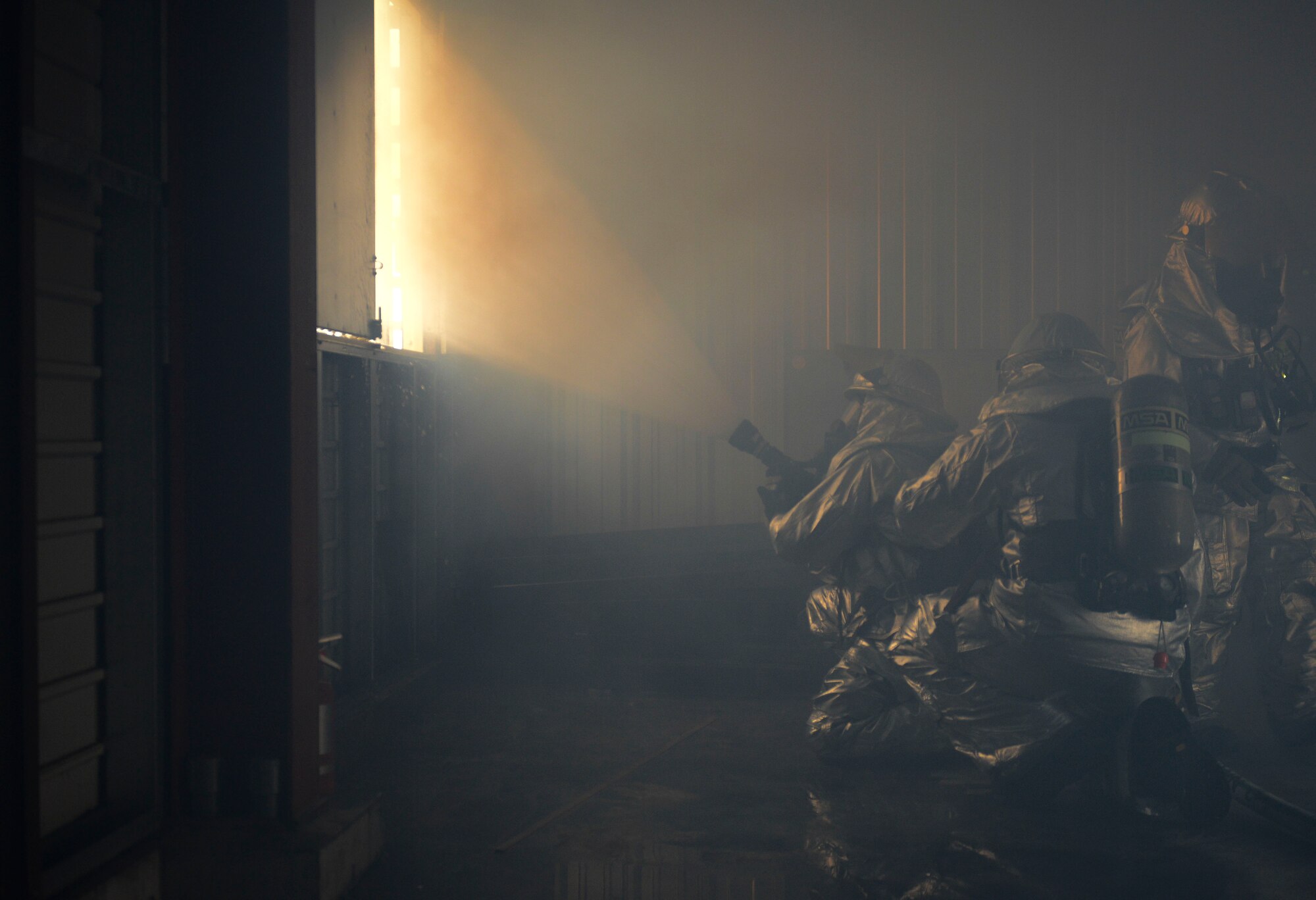 Airman 1st Class Ross Keserich, 374th Civil Engineering Squadron
firefighter, performs hydraulic ventilation at Yokota Air Base, Japan, Jan.
23, 2014.  Hydraulic ventilation is a technique used to ventilate heated
gases from inside a facility. (U.S. Air Force photo by Airman 1st Class
Meagan Schutter/Released)