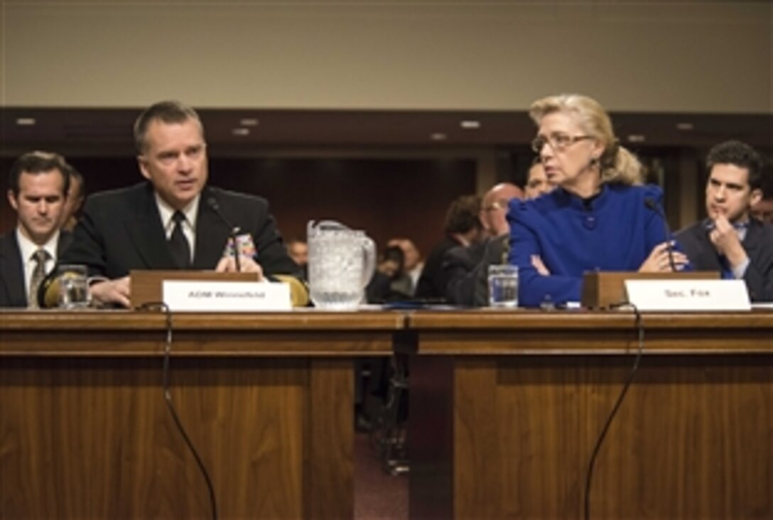 Navy Adm. James A. Winnefeld Jr., vice chairman of the Joint Chiefs of Staff, answers a question as Acting Deputy Defense Secretary Christine H. Fox looks on during testimony before the Senate Armed Services Committee in Washington, D.C., Jan. 28, 2014. Winnefeld and Fox addressed the current budget environment and possible requirement to slow the rate of growth in military compensation.