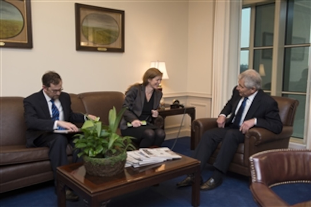 Defense Secretary Chuck Hagel meets with Ambassador Samantha Power, the U.S. permanent representative to the United Nations, in his office at the Pentagon, Jan. 28, 2014.