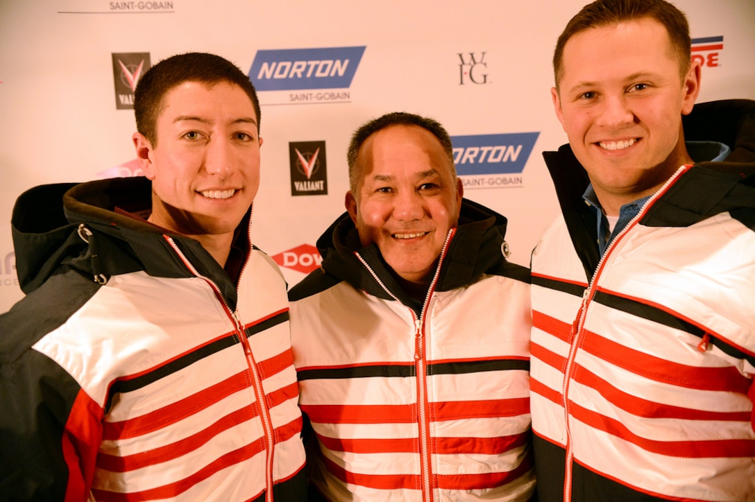 U.S. Army World Class Athlete Program lugers Sgt. Preston Griffall, 29, of Salt Lake City, Utah, and Sgt. Matt Mortensen, 28, of Huntington Station, N.Y., flank WCAP and U.S. Olympic Luge coach Staff Sgt. Bill Tavares after receiving their Team USA jackets Dec. 14 at Utah Olympic Park in Park City, Utah. They will represent the U.S. Army at the 2014 Olympic Winter Games, scheduled for Feb. 6-24 in Sochi, Russia. Mortensen and Griffall secured their spot with a ninth-place finish in the World Cup Luge doubles event Dec. 13 at Utah Olympic Park. On Dec. 14, they anchored Team USA's silver medal winning relay team. U.S. Army photo by Tim Hipps, IMCOM Public Affairs