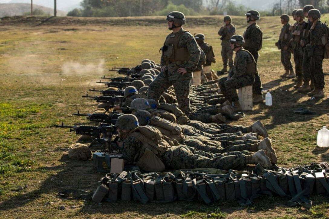 Students engage targets down range during a live fire range on 218A in the 53-area of Camp Pendleton on Jan. 28. The Marine students are training to be basically qualified 0331 machine gunners with Delta Co., Infantry Training Battalion, School of Infantry-West. 

Infantry Training Battalion trains all infantry, entry-level Marines in the infantry skills essential to operating combat environment. Infantry Training Battalion is a 52-day training course that transforms the raw Marine into an infantryman who can fight, survive, and win in a combat situation.


